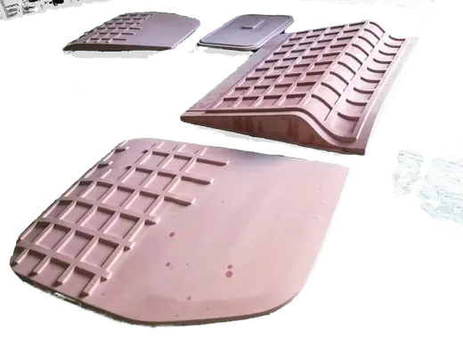 Large ribbed and grid-panel mold set made in-house